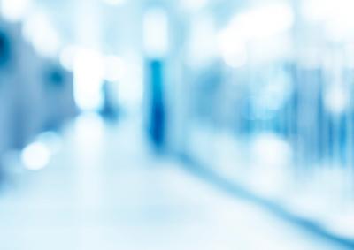 Abstract photo of a blue-tinted hallway